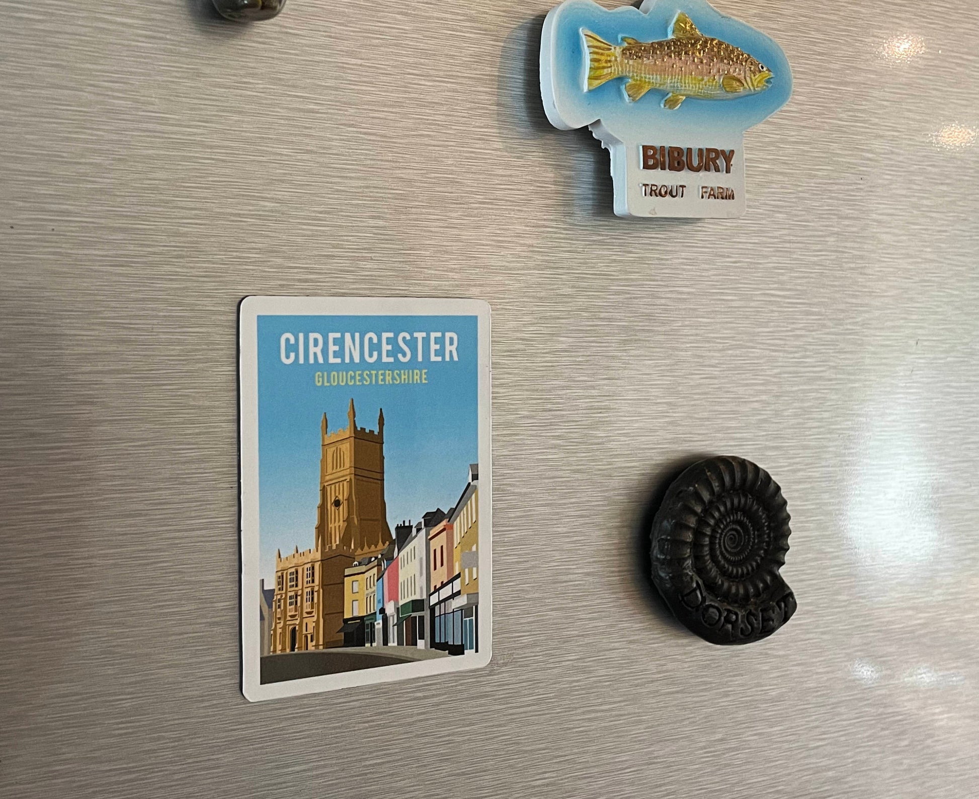Cirencester magnet on fridge with other magnets