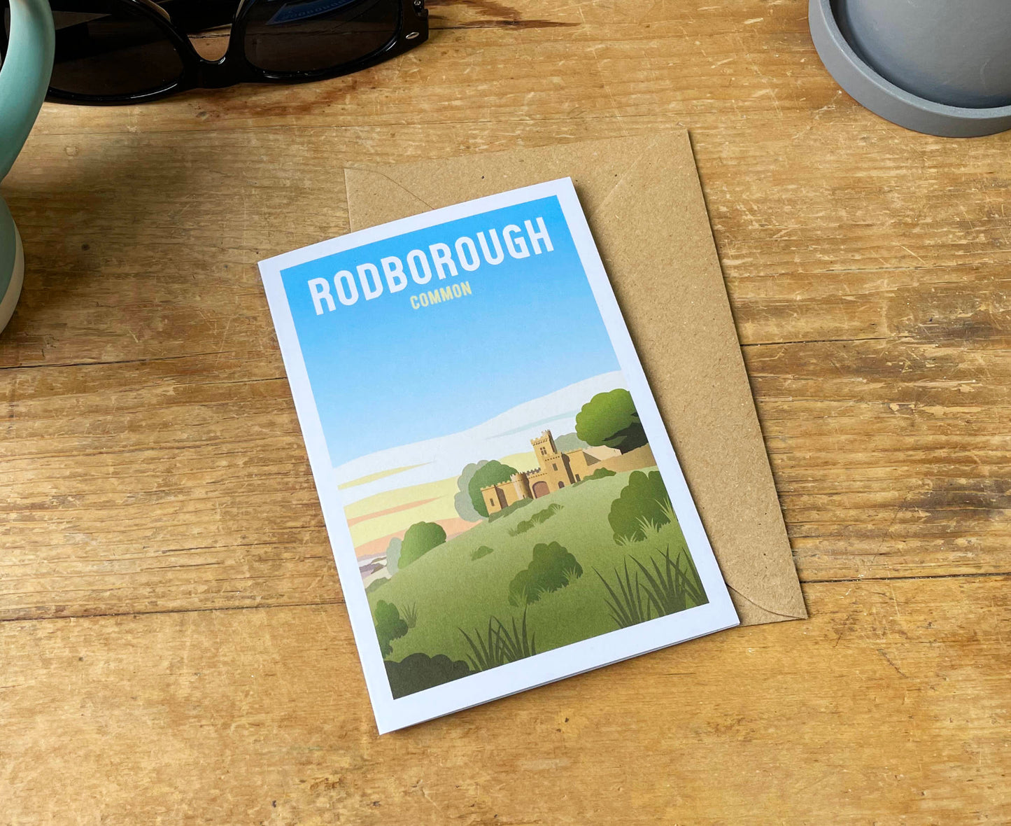 Rodborough Common Greeting Card on table with envelope